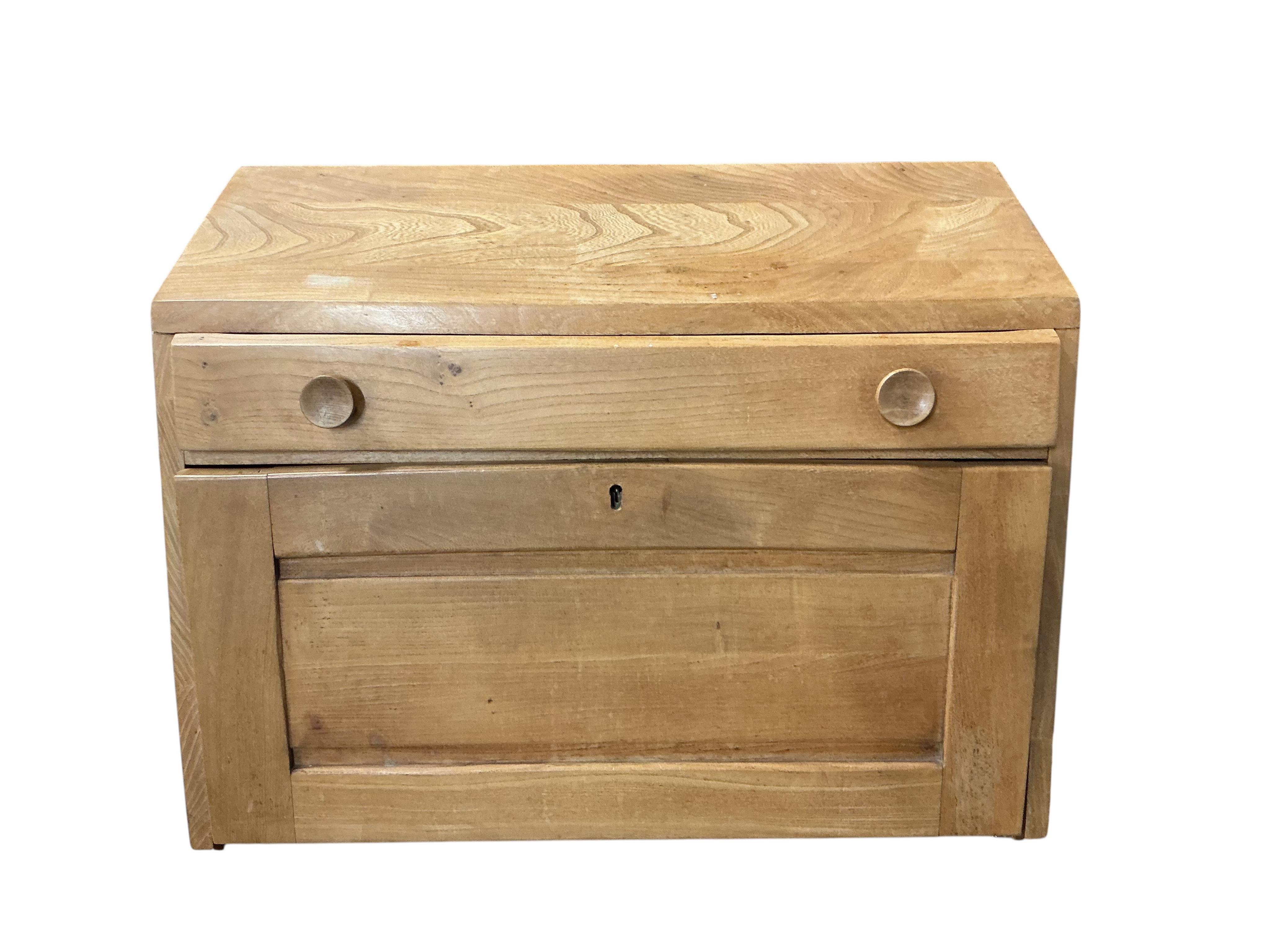 An Ercol elm writing cabinet, width 83cm, depth 42cm, height 37cm